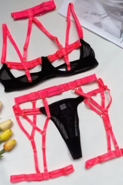 4tlg. Dessous Set mit Bändern - schwarz neonpink